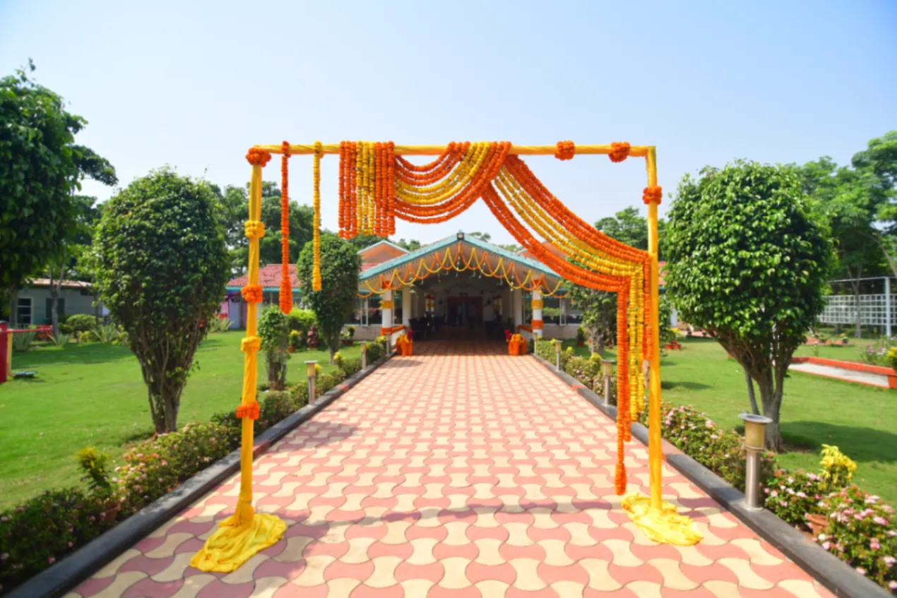 Marigold archway on the villa grounds for a family function
